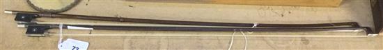 Two violin bows, one stamped W. Dollenz